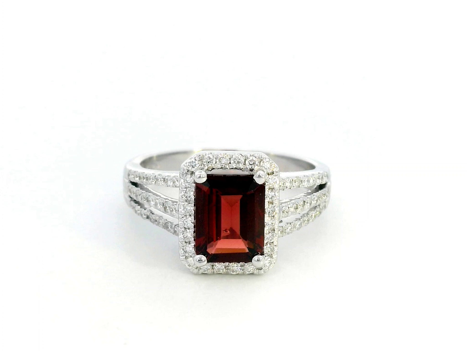 Emerald-cut 1.68-carat Garnet ring with 0.38-carat diamond halo and split-shank design in 18K gold – January birthstone engagement ring or statement jewelry.