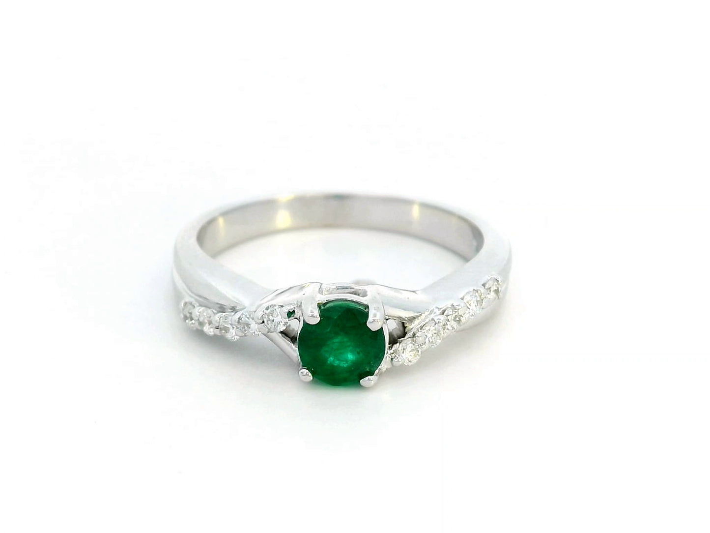 Round-cut 0.38-carat Emerald ring with 0.15-carat diamond accents in 18K gold, crossover band – May birthstone fine jewelry, engagement or cocktail ring.