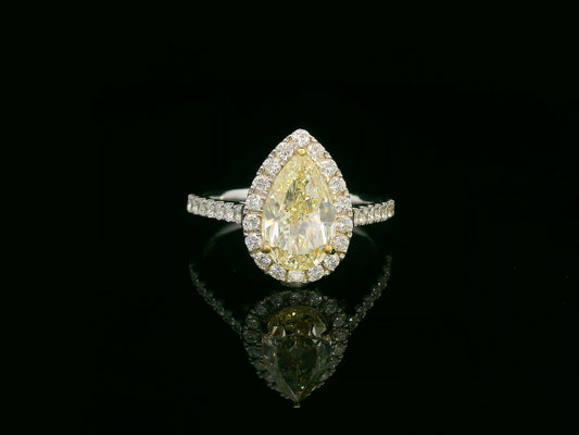 18K white gold ring with IGI certified 2.15ct pear-shaped fancy yellow diamond and 0.50ct white diamond halo