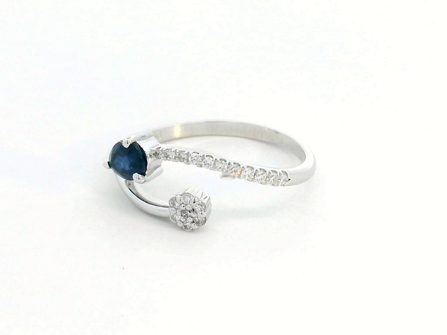 18K Gold Open Bypass Ring with 0.54 CT Blue Sapphire & 0.14 CT Diamond Cluster