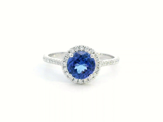 Elegant 1.55-carat round Tanzanite and diamond halo ring in 18K gold – luxury gemstone jewelry