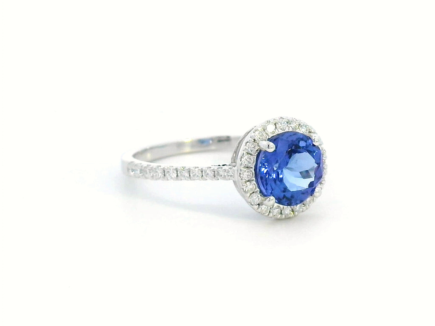 Elegant 1.55-carat round Tanzanite and diamond halo ring in 18K gold – luxury gemstone jewelry