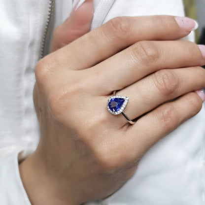 18K gold pear-shaped tanzanite halo ring with 1.60 Ct tanzanite and 0.15 Ct diamond accents, luxury gemstone jewelry