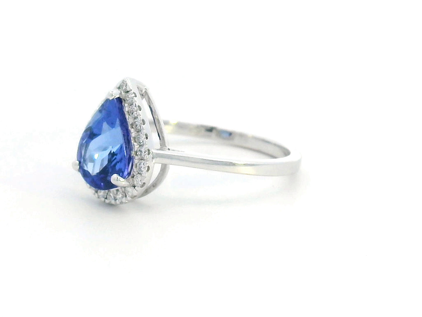 18K gold pear-shaped tanzanite halo ring with 1.60 Ct tanzanite and 0.15 Ct diamond accents, luxury gemstone jewelry