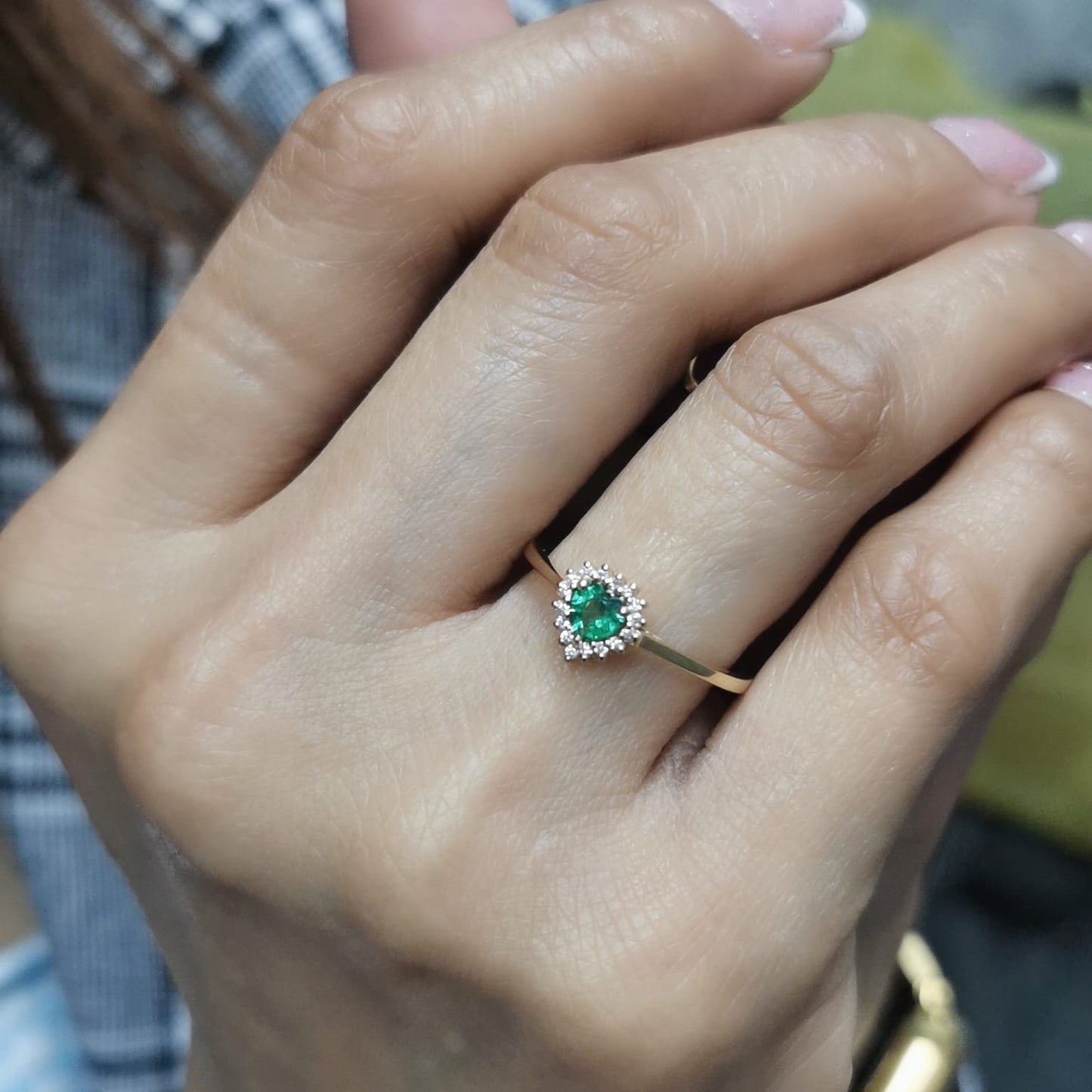 Heart-shaped emerald and diamond halo ring in 18K yellow gold, 0.31 CT emerald, 0.08 CT diamonds, romantic fine jewelry