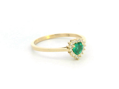 Heart-shaped emerald and diamond halo ring in 18K yellow gold, 0.31 CT emerald, 0.08 CT diamonds, romantic fine jewelry