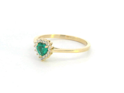 Heart-shaped emerald and diamond halo ring in 18K yellow gold, 0.31 CT emerald, 0.08 CT diamonds, romantic fine jewelry