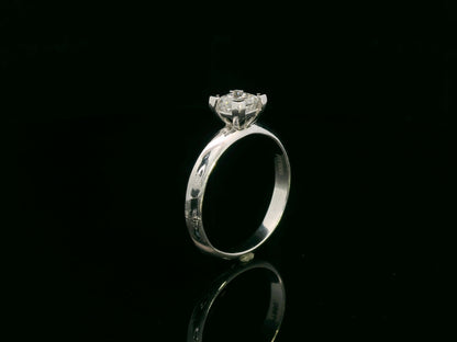 18K white gold solitaire ring with a 0.77ct princess-cut diamond, IGI certified, elegant minimalist engagement design by Emirates Diamonds.