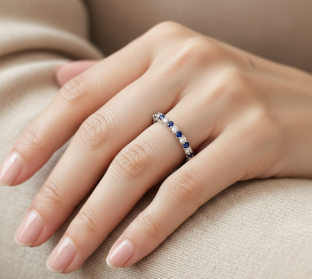 18K white gold band ring with alternating blue sapphires and diamonds, total sapphire weight 0.28 carat and total diamond weight 0.18 carat – Emirates Diamonds