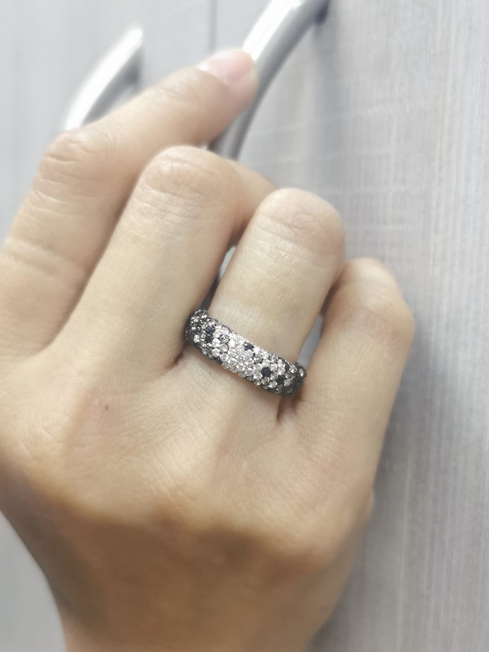 18K gold ring with black, champagne, and white diamonds in pave setting – 1.20 carats total.