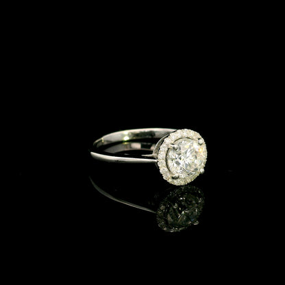 18K white gold round diamond halo engagement ring with a 0.98 carat IGI certified centre diamond and sparkling diamond halo.