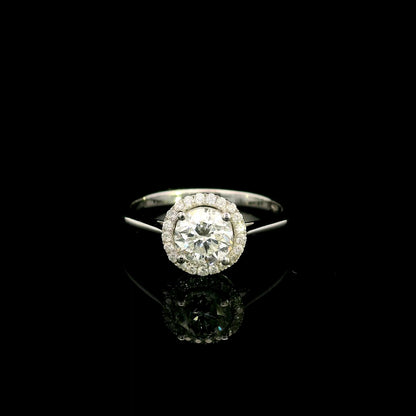 18K white gold round diamond halo engagement ring with a 0.98 carat IGI certified centre diamond and sparkling diamond halo.