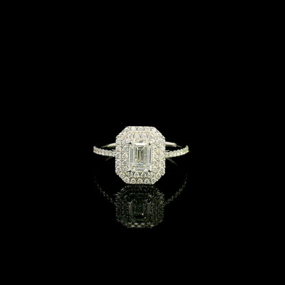 18K white gold halo engagement ring featuring a 1.00 carat GIA certified natural emerald cut diamond with VVS2 clarity and E colour, surrounded by a double halo and 0.43 carat natural round brilliant diamonds.