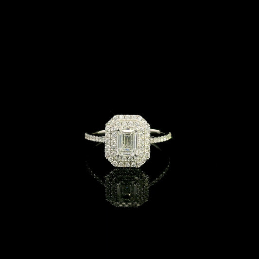 18K white gold halo engagement ring featuring a 1.00 carat GIA certified natural emerald cut diamond with VVS2 clarity and E colour, surrounded by a double halo and 0.43 carat natural round brilliant diamonds.