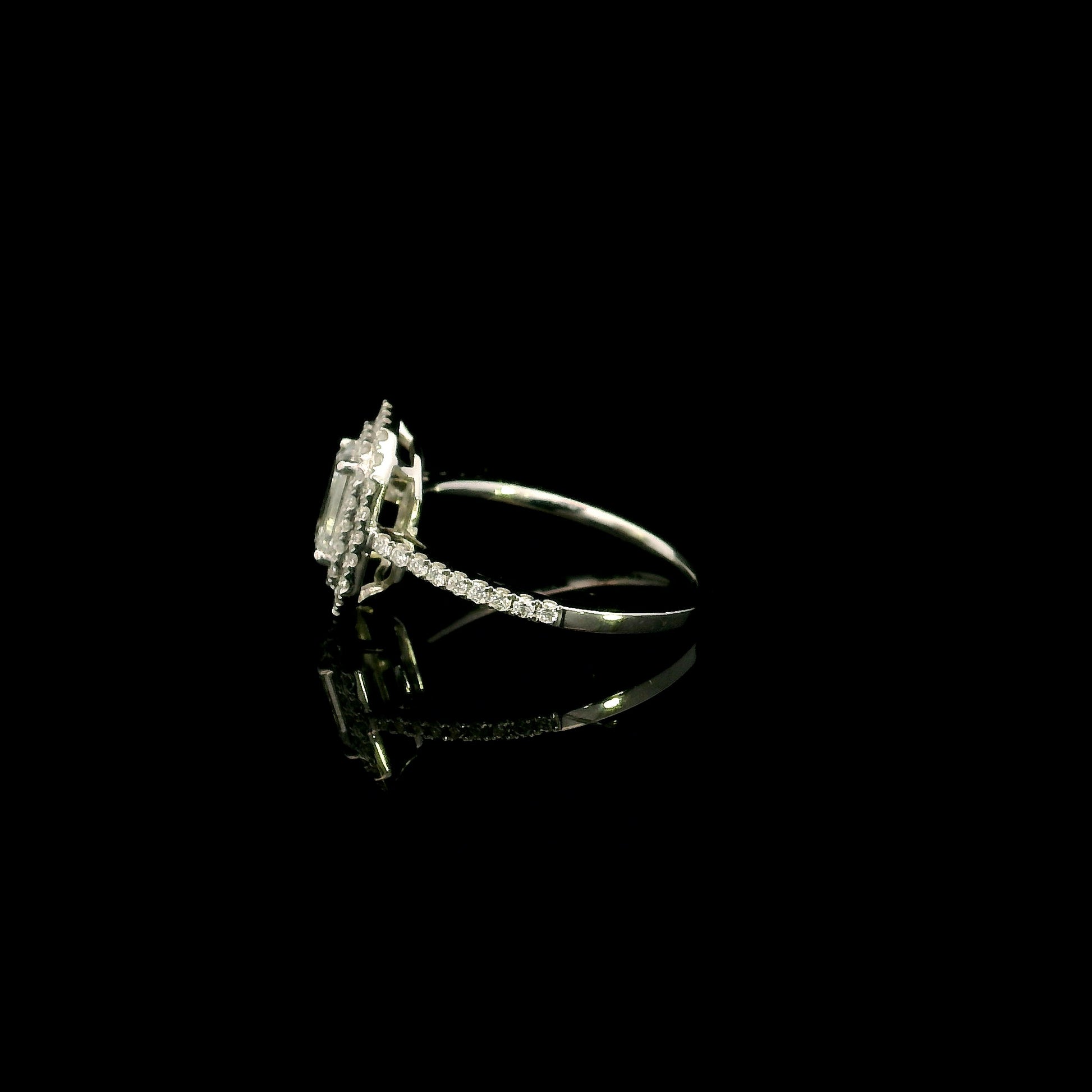 18K white gold halo engagement ring featuring a 1.00 carat GIA certified natural emerald cut diamond with VVS2 clarity and E colour, surrounded by a double halo and 0.43 carat natural round brilliant diamonds.