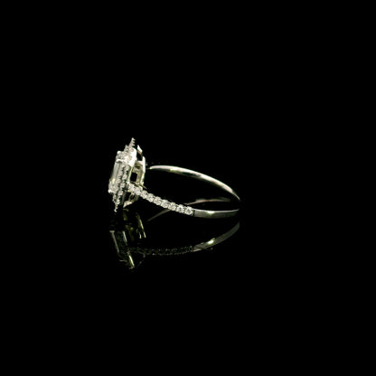 18K white gold halo engagement ring featuring a 1.00 carat GIA certified natural emerald cut diamond with VVS2 clarity and E colour, surrounded by a double halo and 0.43 carat natural round brilliant diamonds.