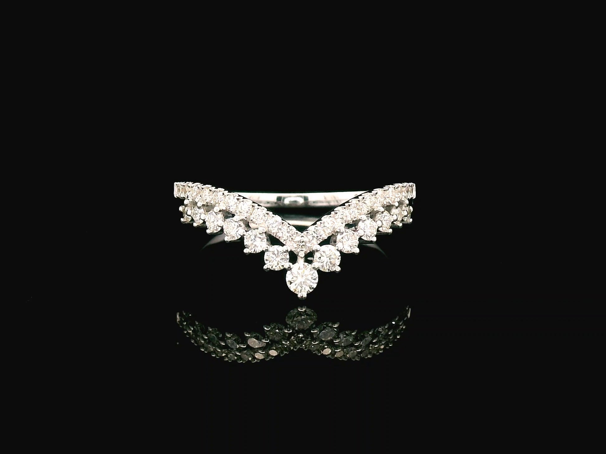 18K gold V-shape diamond ring with 0.47 carat round diamonds in a chevron silhouette
