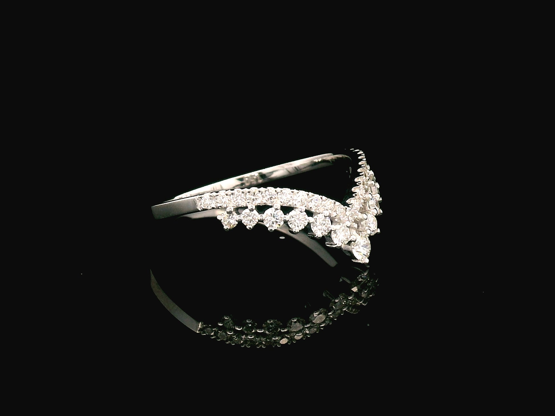 18K gold V-shape diamond ring with 0.47 carat round diamonds in a chevron silhouette