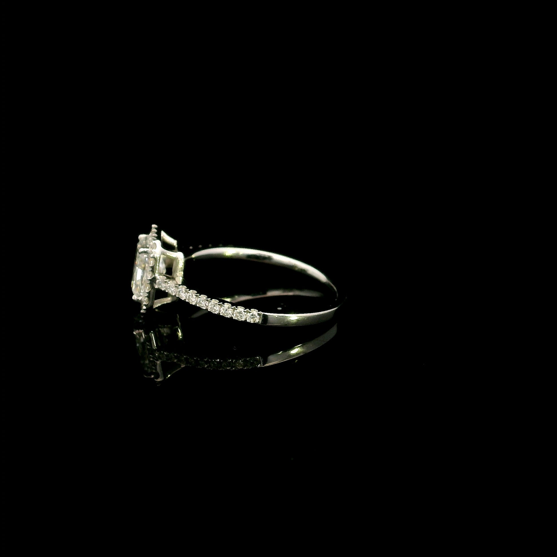 18K white gold radiant cut diamond halo engagement ring featuring a 1.01 carat GIA certified natural diamond with a diamond halo and pavé band.