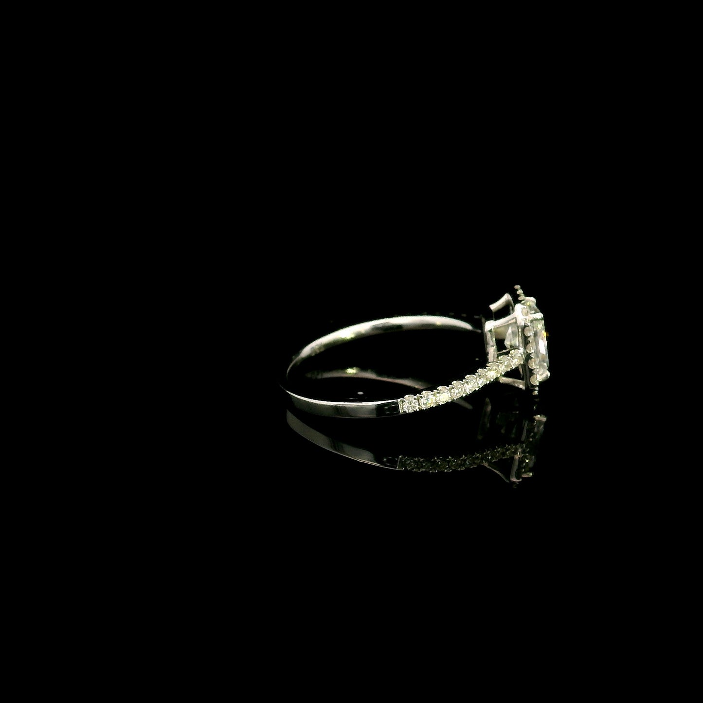 18K white gold radiant cut diamond halo engagement ring featuring a 1.01 carat GIA certified natural diamond with a diamond halo and pavé band.
