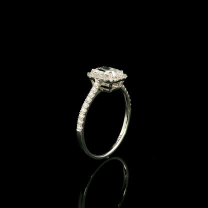 18K white gold radiant cut diamond halo engagement ring featuring a 1.01 carat GIA certified natural diamond with a diamond halo and pavé band.