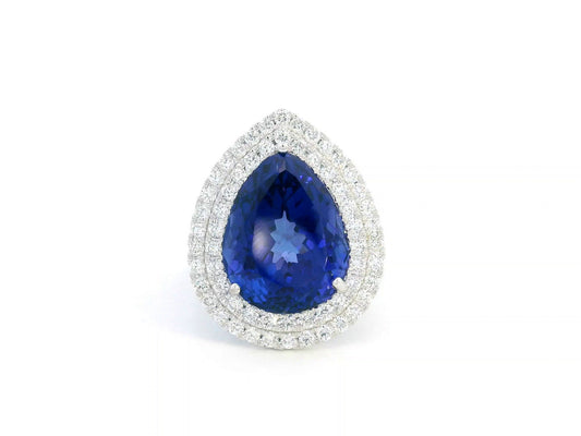 Pear-shaped tanzanite cocktail ring with double diamond halo in 18K gold