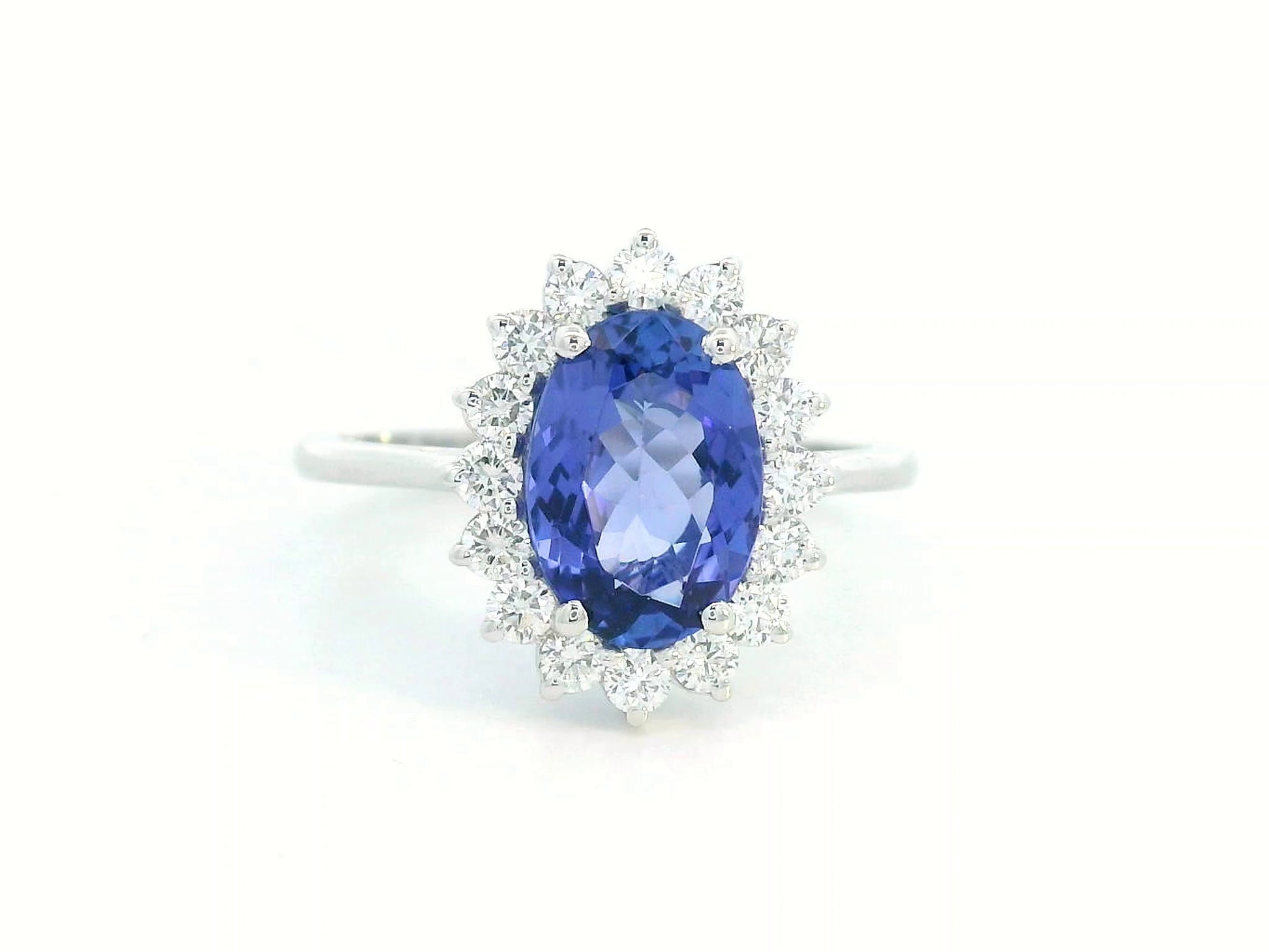 Oval-cut 1.99 carat tanzanite ring with diamond halo in 18K white gold inspired by Princess Diana