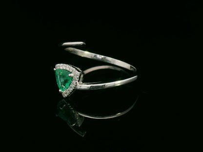 18K gold open band ring with trillion-cut emerald and diamond halo