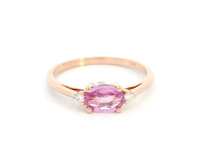 Oval pink sapphire and diamond ring in 18K rose gold

