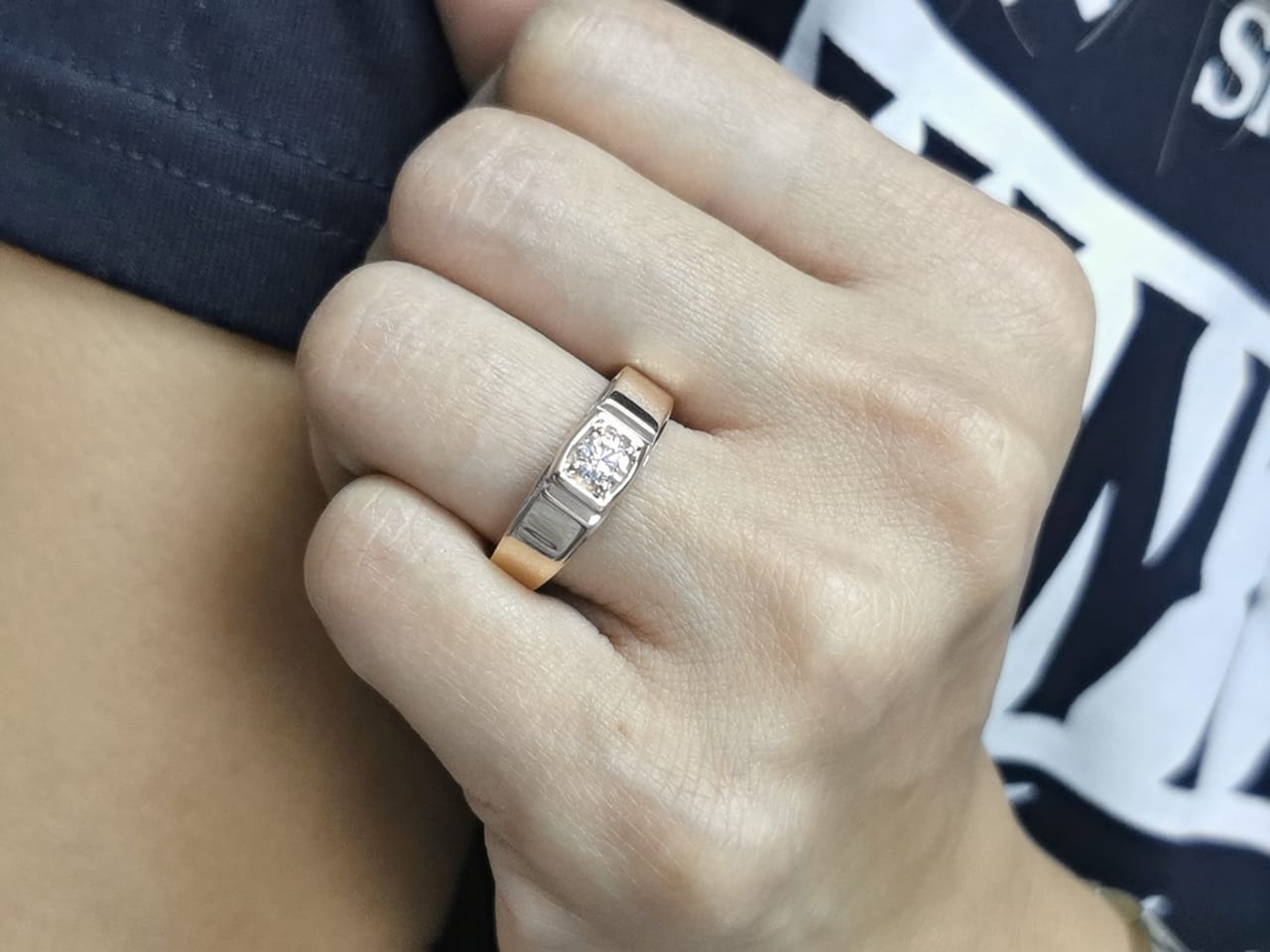 Men’s 18K gold solitaire ring with 0.32 carat diamond in four-prong setting, wide band design

