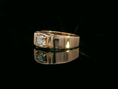 Men’s 18K gold solitaire ring with 0.32 carat diamond in four-prong setting, wide band design

