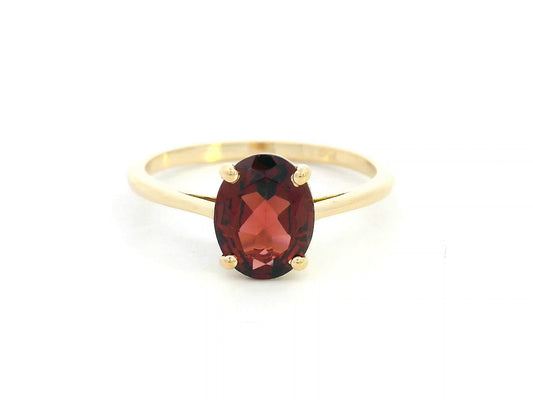 18K Yellow Gold Ring with 1.66 Carat Oval Garnet on Polished Band

