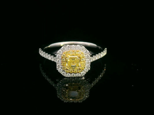 Asscher cut fancy yellow diamond ring with dual halo in 18K gold featuring yellow and white diamonds