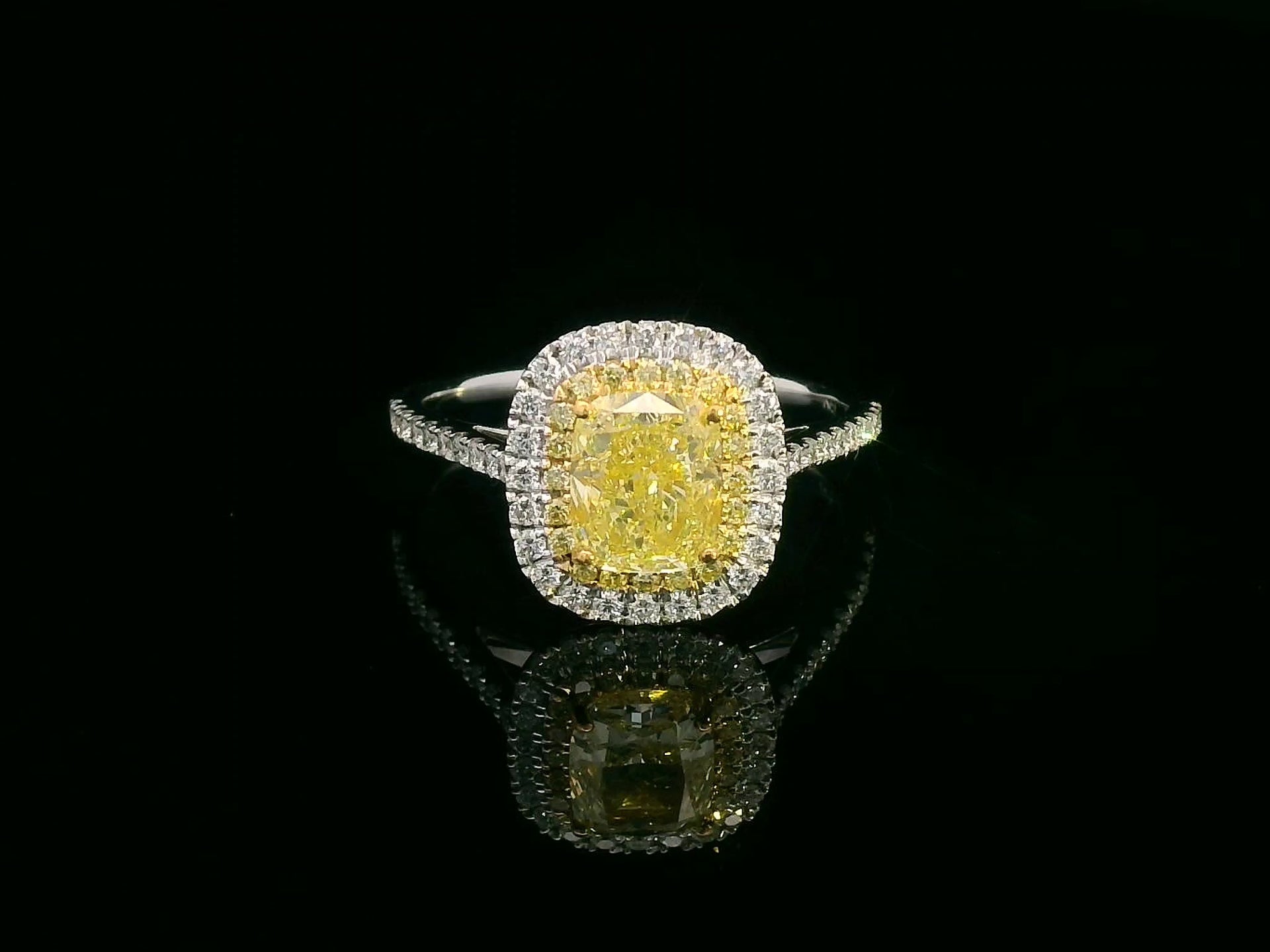 1.51 Carat Fancy Yellow Cushion Cut Diamond Ring with Double Halo in 18K Gold ( GIA certified )