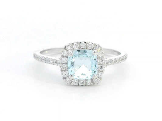 18K white gold ring with cushion-cut aquamarine center and diamond halo and band