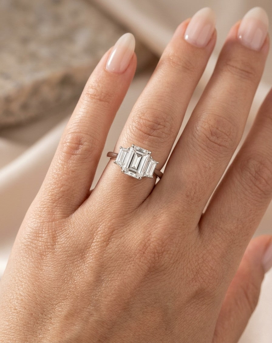 Emerald Cut Three Stone Diamond Engagement Ring in 18K White Gold
