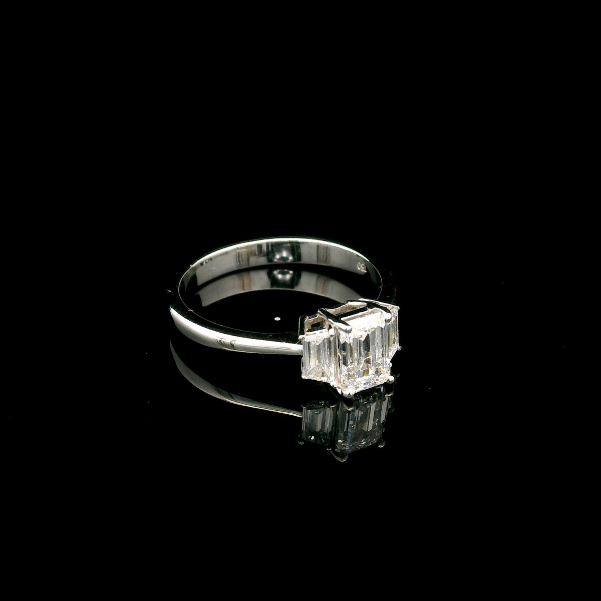 Emerald Cut Three Stone Diamond Engagement Ring in 18K White Gold