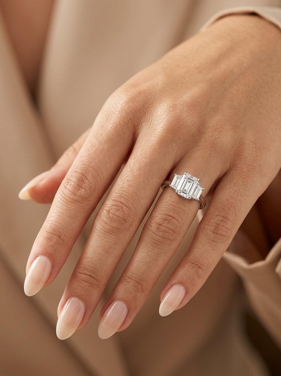 Emerald Cut Three Stone Diamond Engagement Ring in 18K White Gold