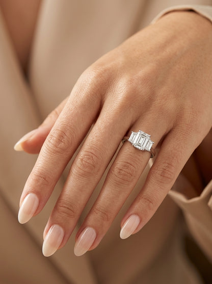 Emerald Cut Three Stone Diamond Engagement Ring in 18K White Gold