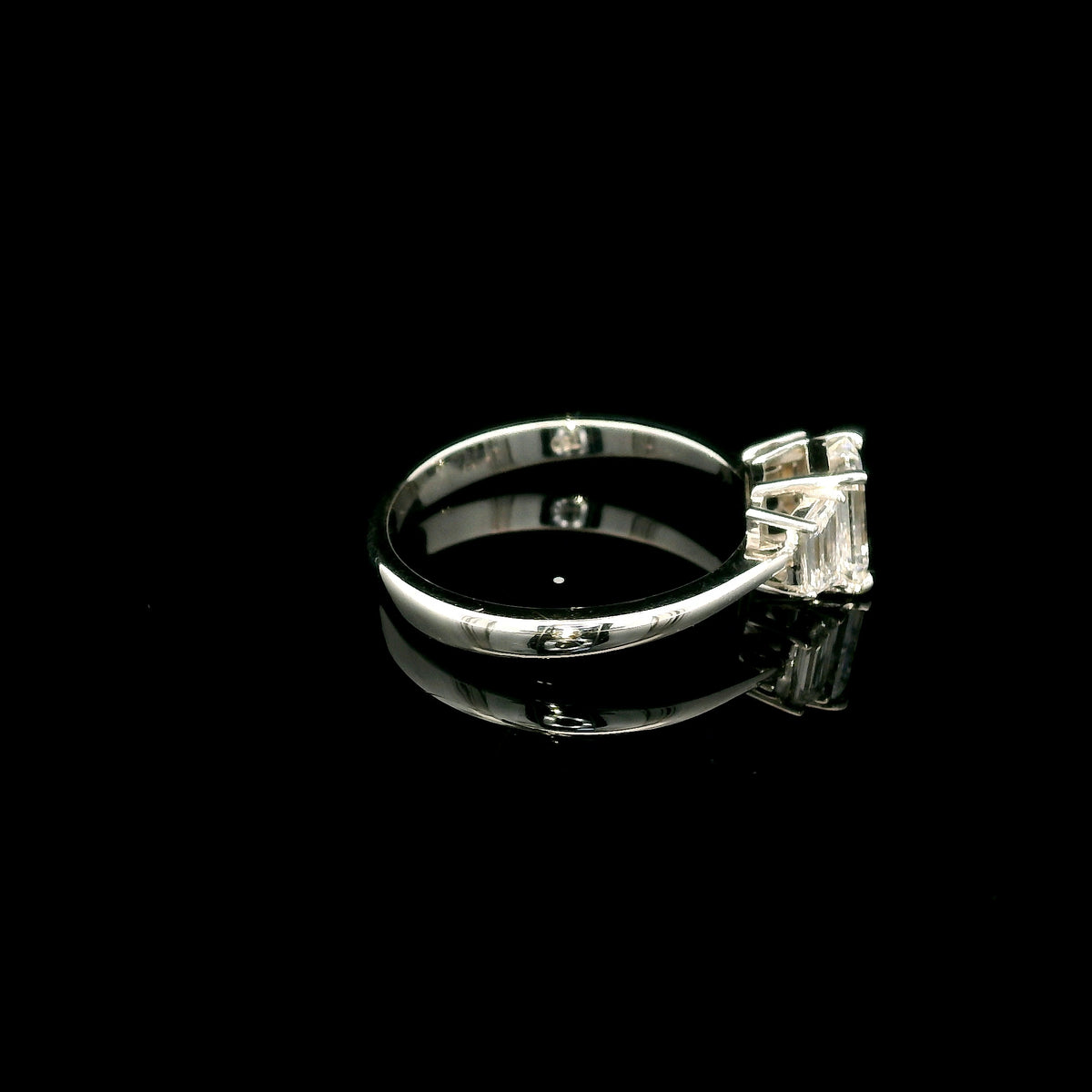 Emerald Cut Three Stone Diamond Engagement Ring in 18K White Gold