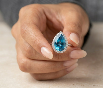 London Blue Topaz Pear Shape Halo Ring in 18K White Gold