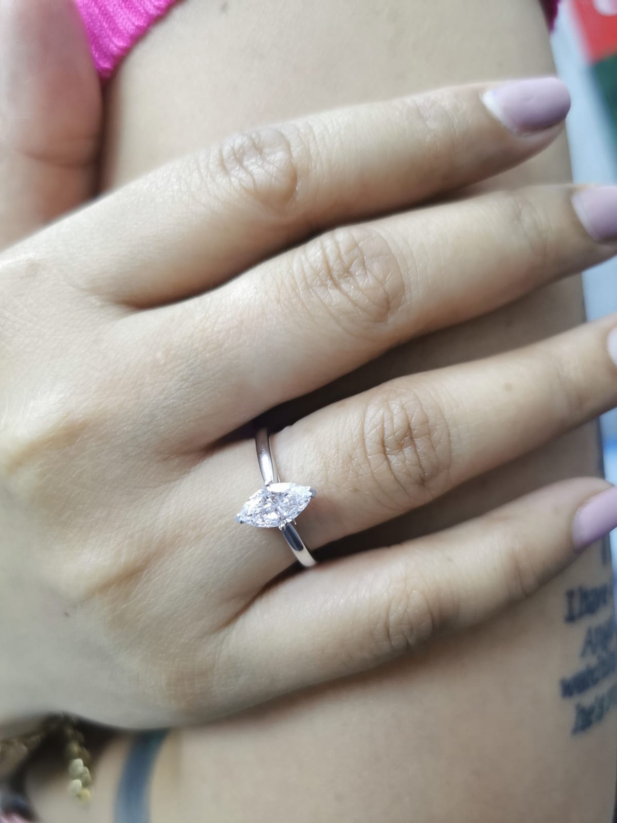 18K white gold solitaire engagement ring with 1.01 carat marquise diamond, D color, IGI certified