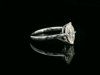 18K white gold solitaire engagement ring with 1.01 carat marquise diamond, D color, IGI certified