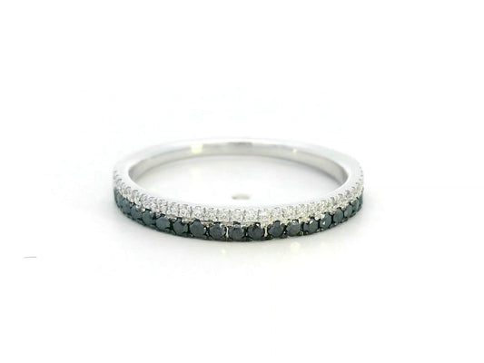 18K white gold ring with parallel rows of white and black diamonds in a modern half eternity band design.