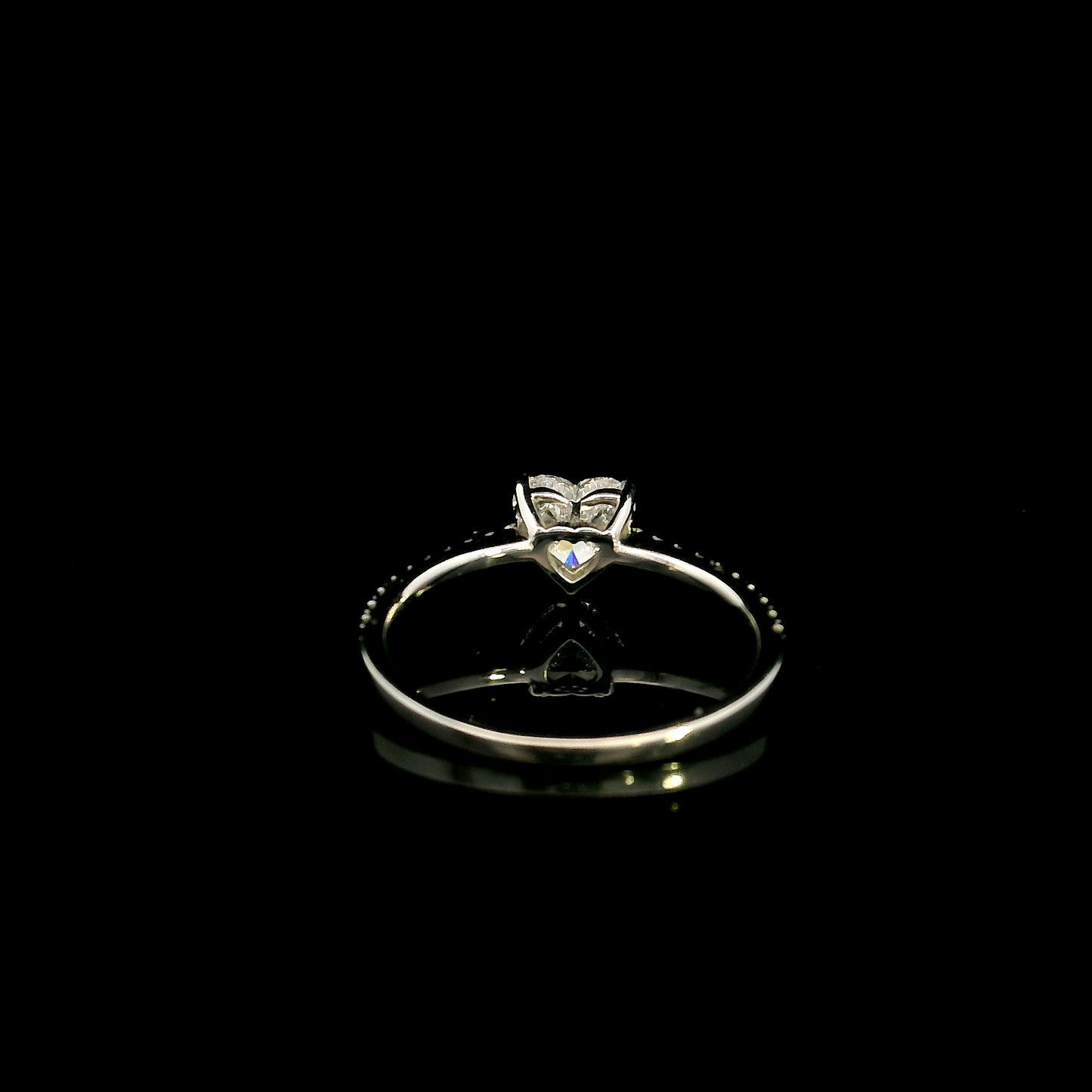 18K white gold heart shaped diamond engagement ring featuring a 0.90 carat IGI certified natural heart diamond with a pavé diamond band.