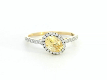 18K Gold Yellow Oval-shape Sapphire Ring with Diamond Halo.