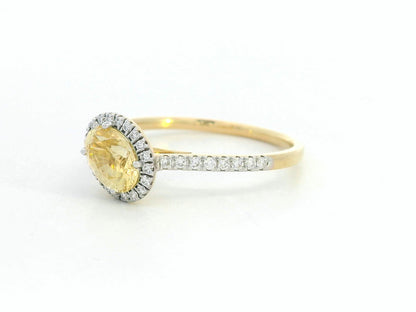 18K Gold Yellow Oval-shape Sapphire Ring with Diamond Halo.