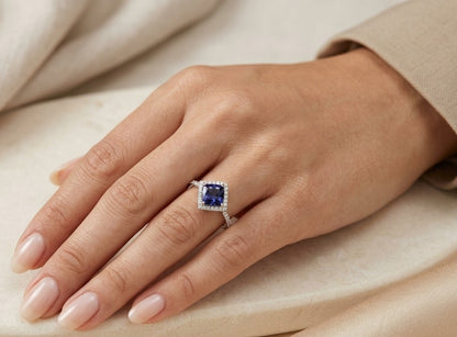 Blue Sapphire and Diamond Halo Ring in 18K White Gold