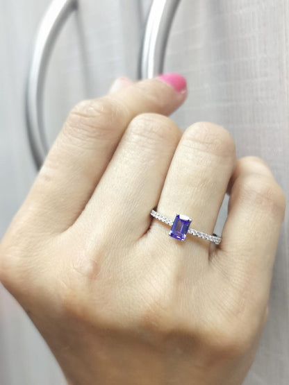 Emerald-cut Tanzanite ring in 18K white gold with diamond-accented band – 0.56ct center stone