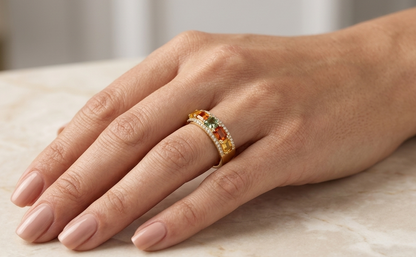 Natural multi sapphire ring in solid 18K yellow gold featuring 1.45 carats of emerald-cut rainbow sapphires with 0.15 carats of natural diamonds in an elegant gemstone band.
